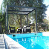 Pergola bioclimatique 10,80m² alu + toit avec lames ovales HABRITA