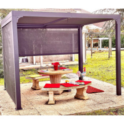 Pergola bioclimatique 7,20m² alu, lames orientables, 2 rideaux HABRITA
