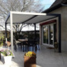Pergola bioclimatique 10,80m² alu gris + toit avec lames écru HABRITA