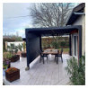 Pergola bioclimatique 10,80m² alu gris + 2 rideaux latéraux HABRITA