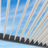 Pergola bioclimatique alu anthracite et lames blanches 3x4m Ombrea