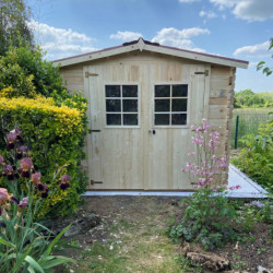 Abri 6,16m² en bois massif avec toit en plaques ondulées HABRITA